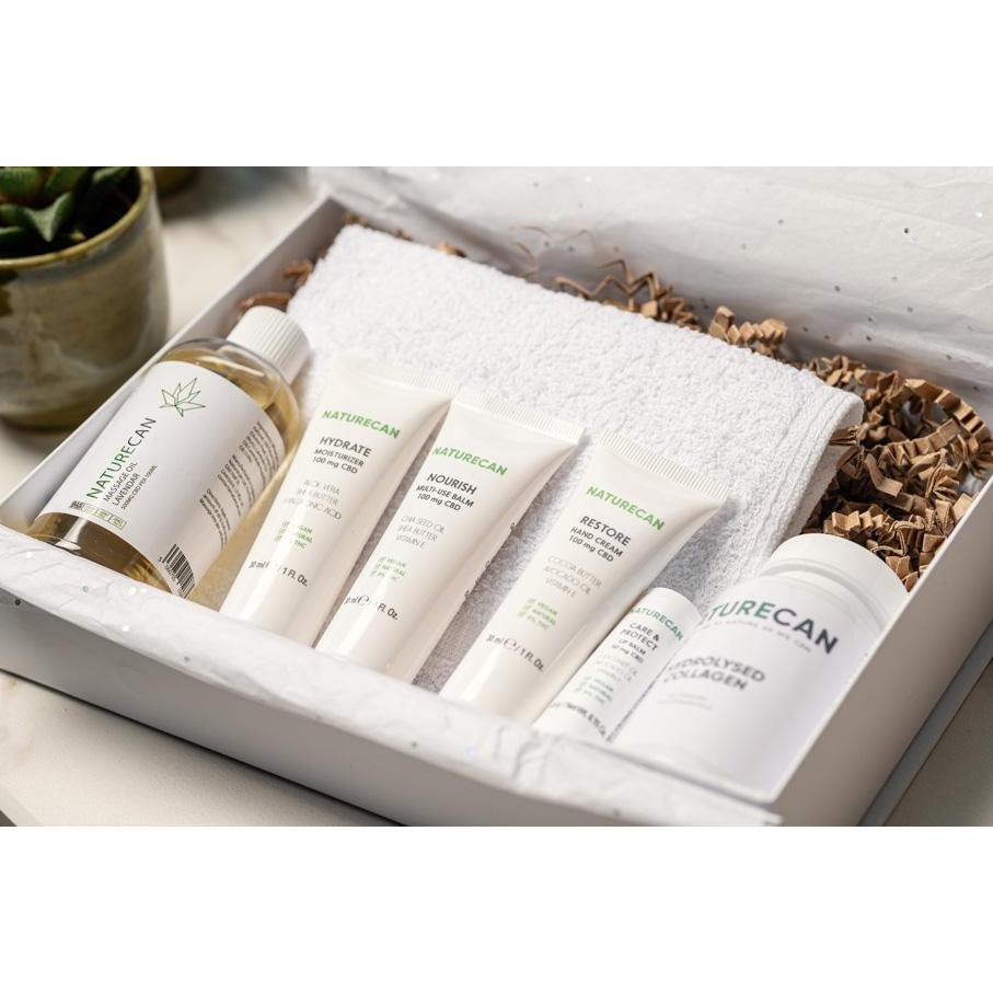 CBD essentials beauty box with products in packaging